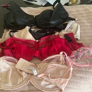Gifted with purchase. Lot  of bras. Five total. Two very high-end.